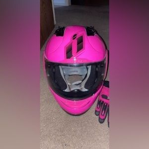 Pink and black motorcycle helmet, size small.